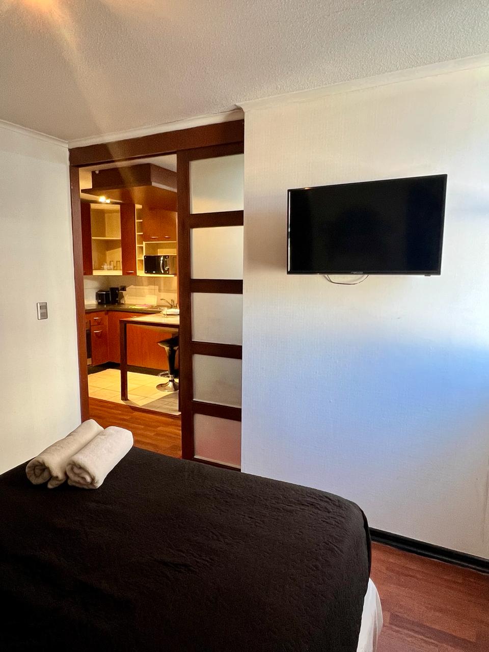 Habitación Departamento Deluxe en Santiago Suit Apartment : MotelNow