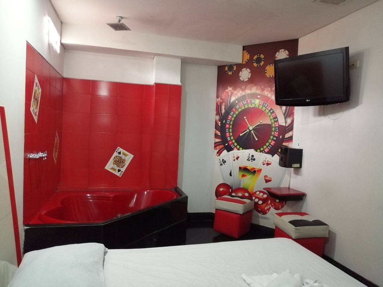 Habitación Bañera en Momentos Suite : MotelNow