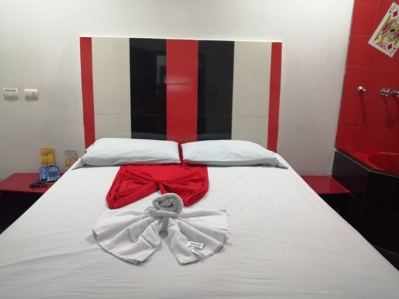 Habitación Bañera en Momentos Suite : MotelNow